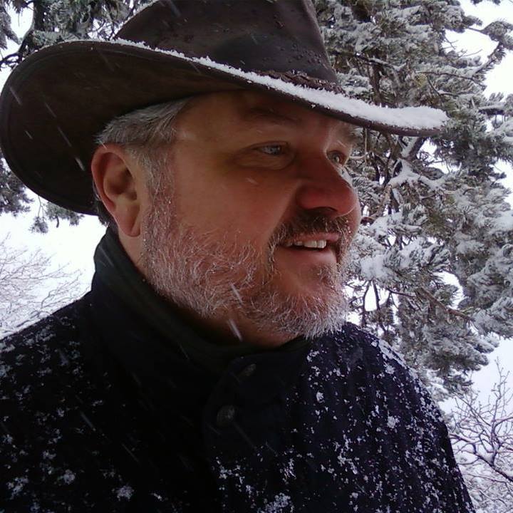 Author Rick Shaw in snowy field